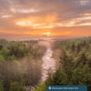 Early morning fog and sunrise sits along Blackwater Falls State Park.