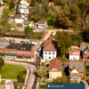An aerial view of houses and businessses in Bramwell, West Virginia.