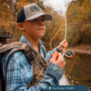 A young man trout fishes in West Virginia
